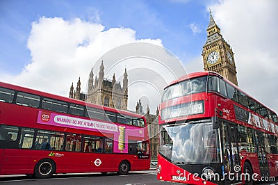 Red buses in front of Houses of Parliament Editorial Stock Photo