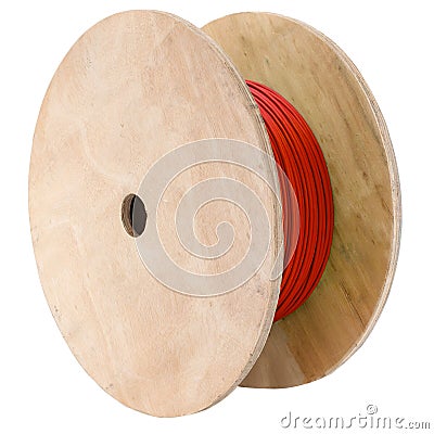 Wooden coil with red cable on a white background. Stock Photo