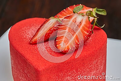 Red cake in the shape of heart on Valentine`s Day Stock Photo