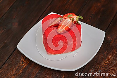 Red cake in the shape of heart on Valentine`s Day Stock Photo