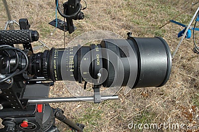 Red camera with long lens Editorial Stock Photo