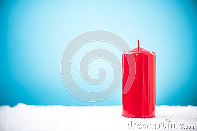 Red candle in snow, Christmas design template Stock Photo