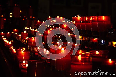 Red candles in church Stock Photo