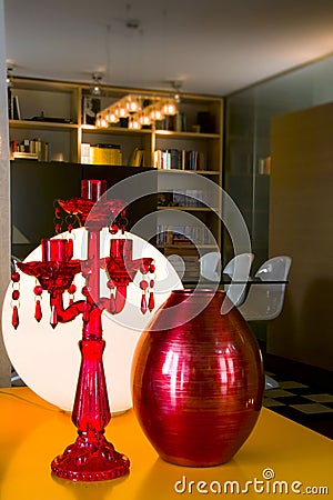 red candlesticks and red vase Stock Photo
