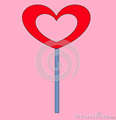 Caramel candy on a stick in the shape of a heart Stock Photo