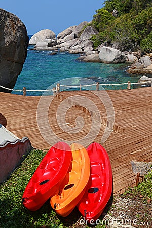 Red canoe at the sea in thailand Tourism bright blue suit Large Stock Photo