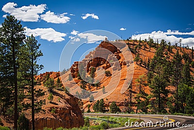 Red Canyon NM in Utah with highway winding through Stock Photo