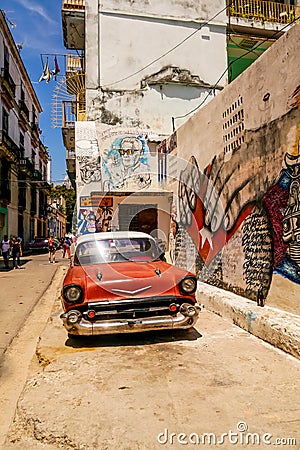 Red Car and Graffiti Editorial Stock Photo