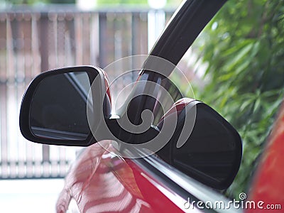 red car left side mirror looking from the back side Stock Photo