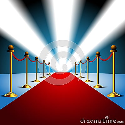 Red carpet to the movie stars with an entertainment theater design, light and gold stanchions. Stock Photo