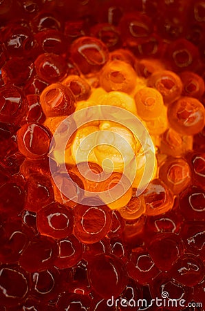 Red caviar close-up, glows from the inside. Oocyte of salmon fish Stock Photo