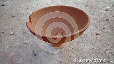 A red ceramic cover used to cover clay cooking pots Stock Photo