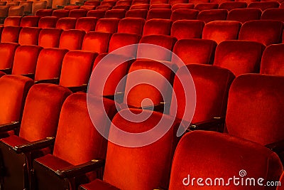 Red Chairs inside a Theatre Stock Photo