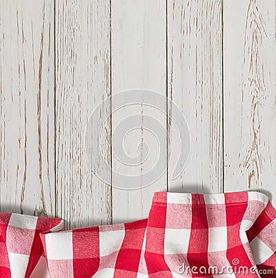 Red checkered picnic tablecloth on white wood table Stock Photo