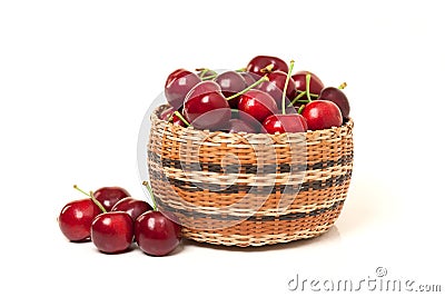 Red Cherries in a basket on white background Stock Photo