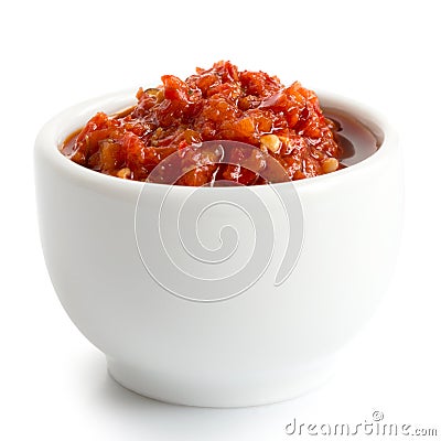 Red chopped chilli peppers in oil. Stock Photo