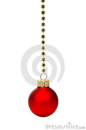 Red Christmas ornament on string of gold beads over white Stock Photo