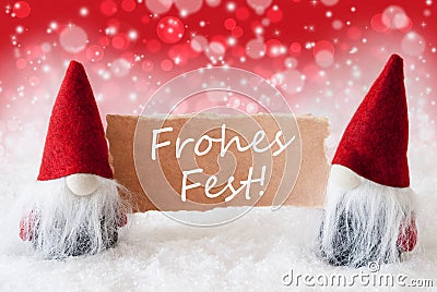 Red Christmassy Gnomes With Card, Frohes Fest Means Merry Christmas Stock Photo