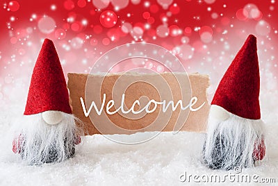 Red Christmassy Gnomes With Card, Text Welcome Stock Photo