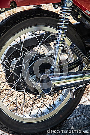 Red chrome motorcycle with spokes Stock Photo