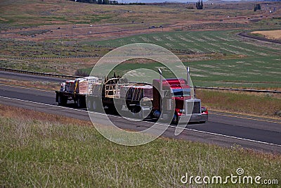 Red Classic Semi-Truck / Loaded Flatbed Stock Photo