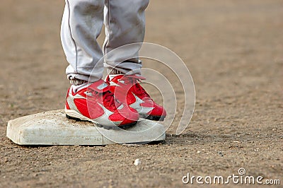 Red Cleats on Base Stock Photo