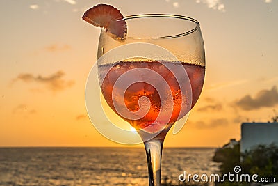 Red cocktail - Drinks at Sunset Curacao Views Stock Photo