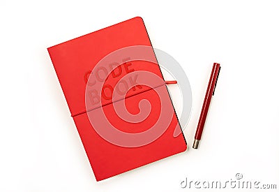 Red Code Book and red pen Stock Photo