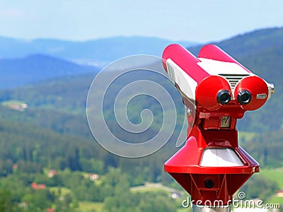 Red coin binoculars for tourists at viewpoint Stock Photo