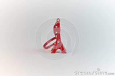 Red color Eiffel tower souvenir keychain. Stock Photo