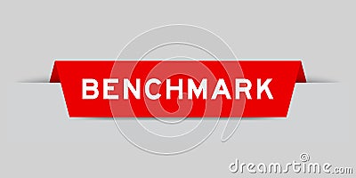 Red inserted label with word benchmark on gray background Vector Illustration