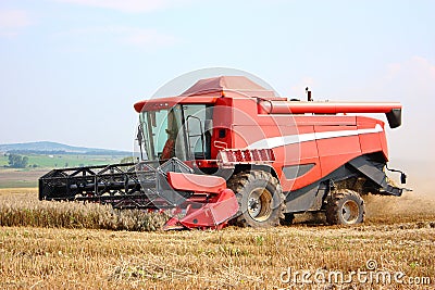 A red combine harvester Stock Photo