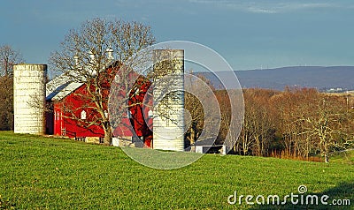 Red Country Farm with silos Stock Photo