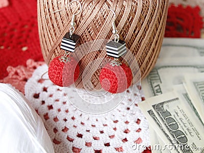 Red crocheted earrings, jewelry, women`s jewelry handmade and needlework Stock Photo