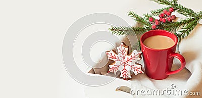 Red cup of hot coffee with christmas gingerbread on white. Holiday banner. Christmas card. Stock Photo