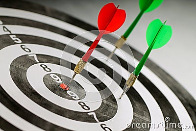 The red dart hits right on target. Stock Photo