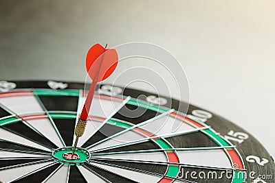 The red dart hits right on target. Stock Photo