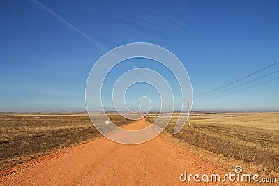 Red dirt roads in the countryside Stock Photo