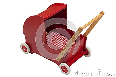 Red dolls pram with doll Stock Photo