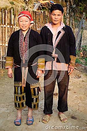 Red Dzao ethnic minority family near the home. Editorial Stock Photo