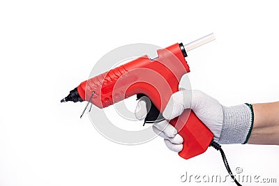 Red electric glue gun. On a white isolated background. Stock Photo