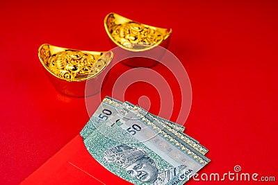 Red envelope angpow with 50 Ringgit Malaysia Stock Photo