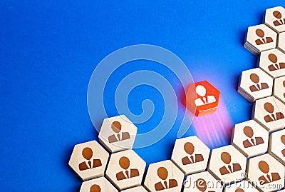 Red figurine of the employee leaves company of people. Leakage of valuable workers. Toxicity and conflict in the team. Leadership Stock Photo