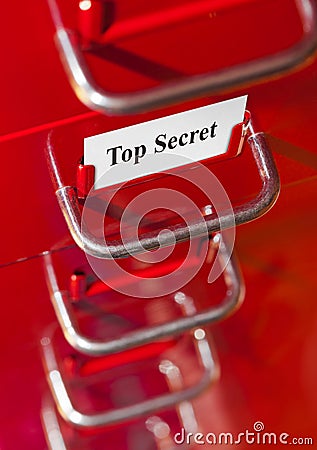 Red file cabinet with card Top Secret Stock Photo