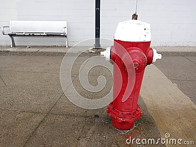 A red fire hydrant, faucet or fire hydrant, a water intake to provide a flow rate in the event of a fire. Water can be obtained fr Stock Photo