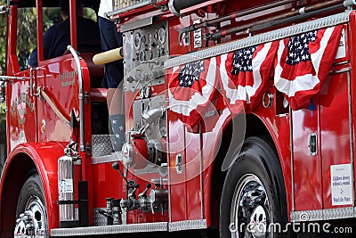 Red Fire Truck Decorated for 4th of July Parade Stock Photo