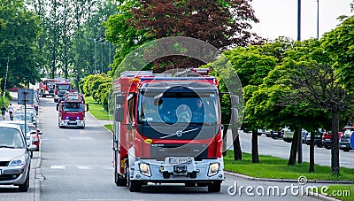 Red fire truck. Departure for rescue operation. fire brigade Editorial Stock Photo