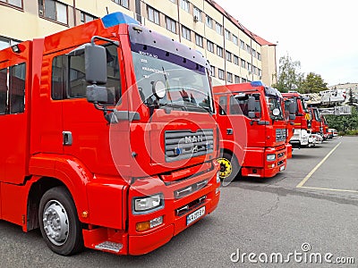 The red fire trucks are on full alert. Fire station and specialized equipment of the company Editorial Stock Photo