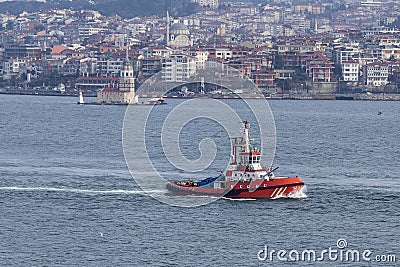 A Red fire tug boat equipped with saftey equipment Stock Photo
