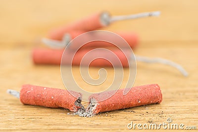 Red Firecrackers on wooden background Stock Photo
